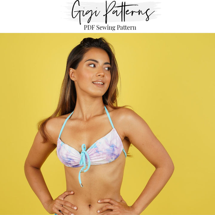 Seamless bikini top sewing pattern with adjustable centre front and back ruching, tie-neck, and tie-back straps. Scoop-style fit with gathered front. Digital PDF includes A4, US Letter, and A0 formats. Sizes XS, S, M, L, XL, 2XL, 3XL, 4XL, 5XL. Step-by-step video tutorial included. Fashion swimwear pattern, DIY bikini top PDF.